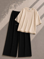 Beige Oversized Tee With Black Flapper Trouser